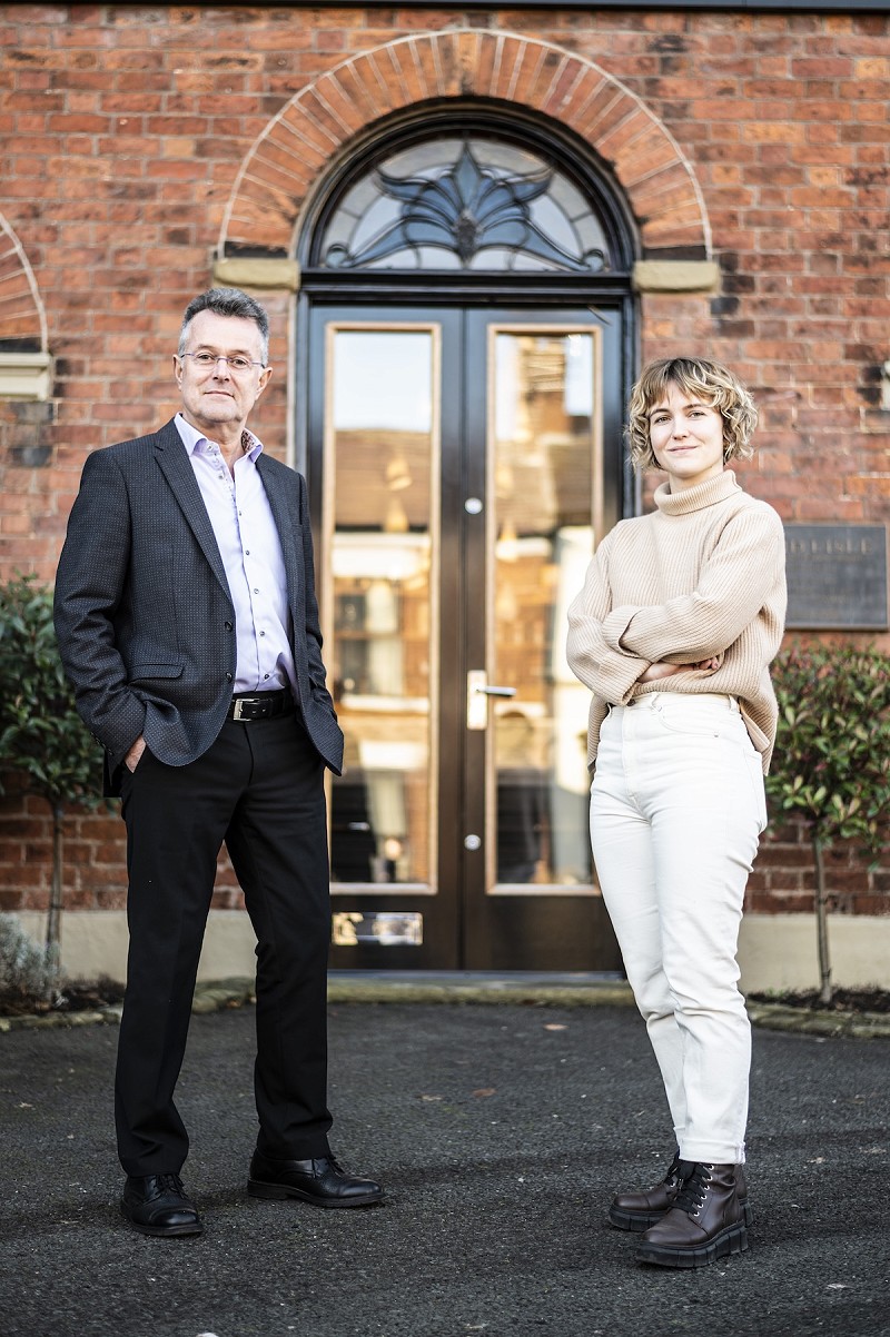 David Lisle and Becky Lisle stood outside their showroom in Macclesfield