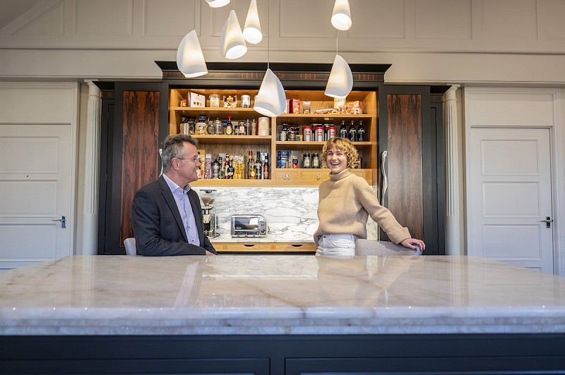 David Lisle and Becky Lisle stood inside their showroom in Macclesfield