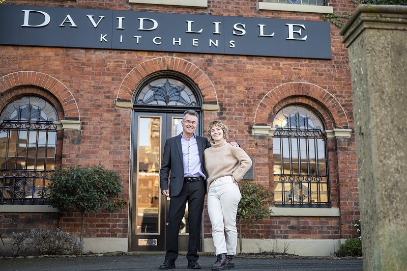 David Lisle and Becky Lisle stood outside their showroom in Macclesfield